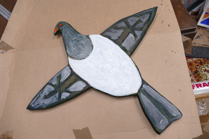 Kererū peace dove in studio. Acrylic on ply.